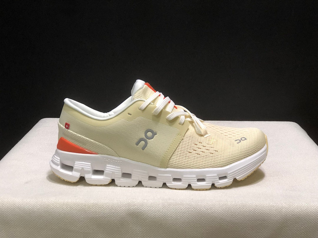 On Cloud X 4 Sneakers in Cream and Orange