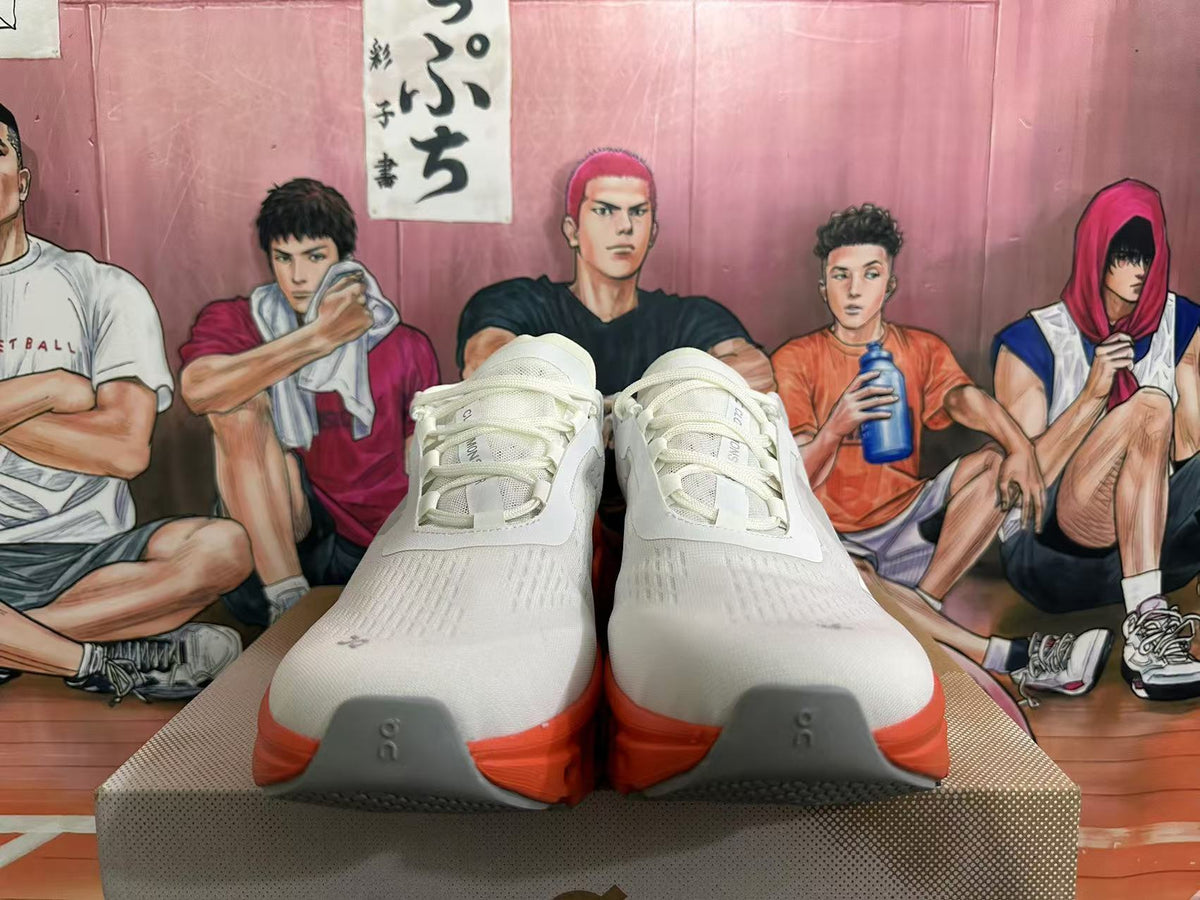 On Running Shoes in White and Orange