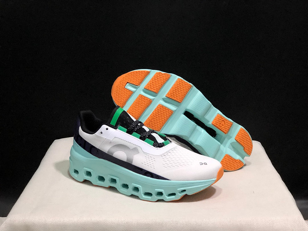 On Cloudmonster Running Shoes in White and Aqua
