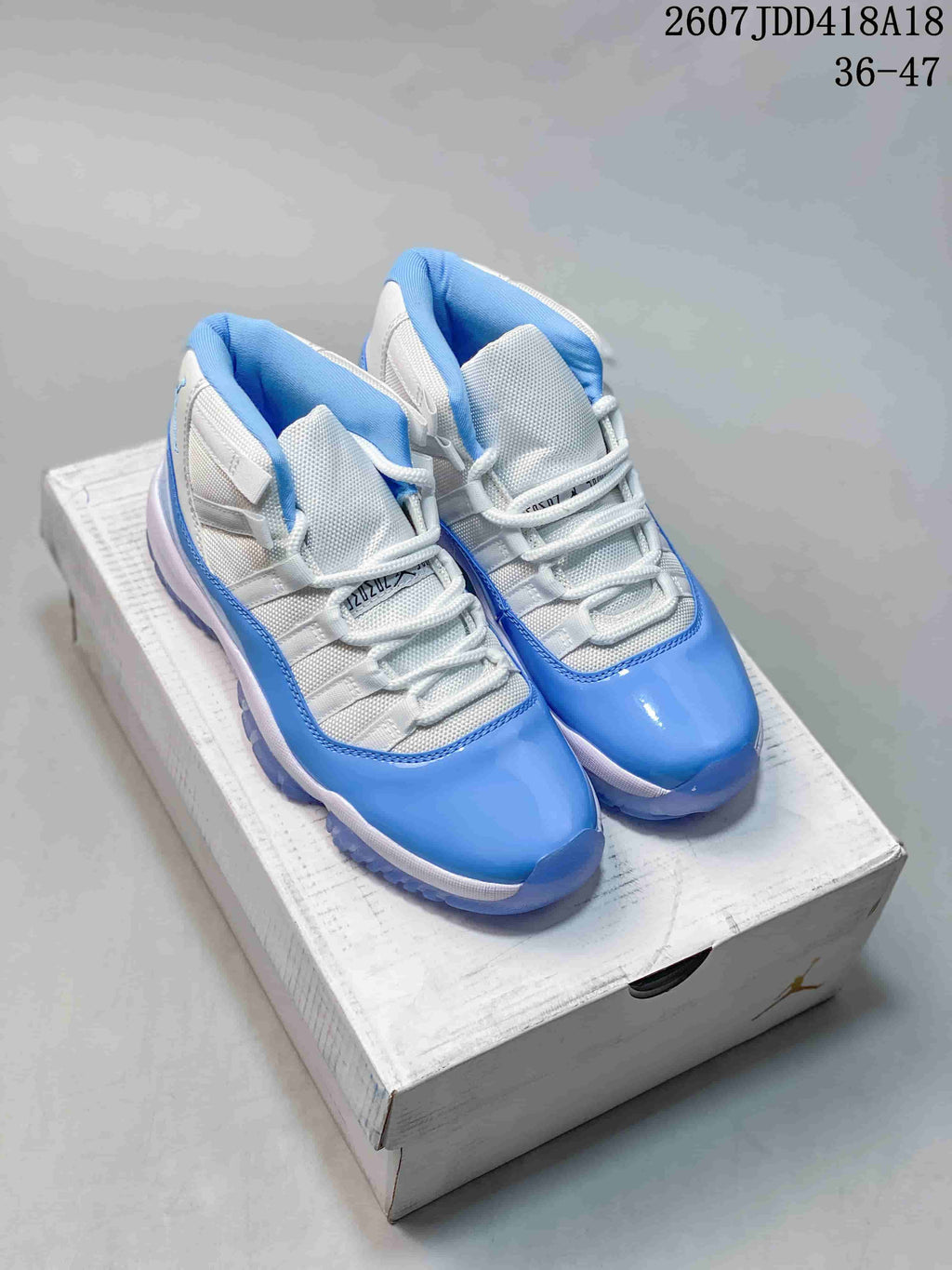 Jordan Air Jordan 11 Retro High-Top Sneakers Blue and White