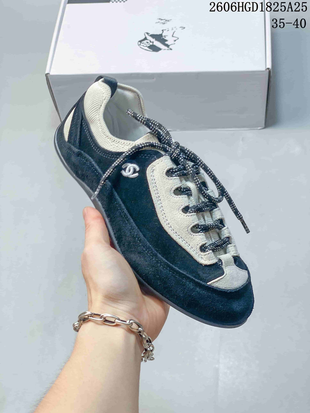 Chanel Two-Tone Low-Top Sneakers, Black and White, 2606HGD1825A25