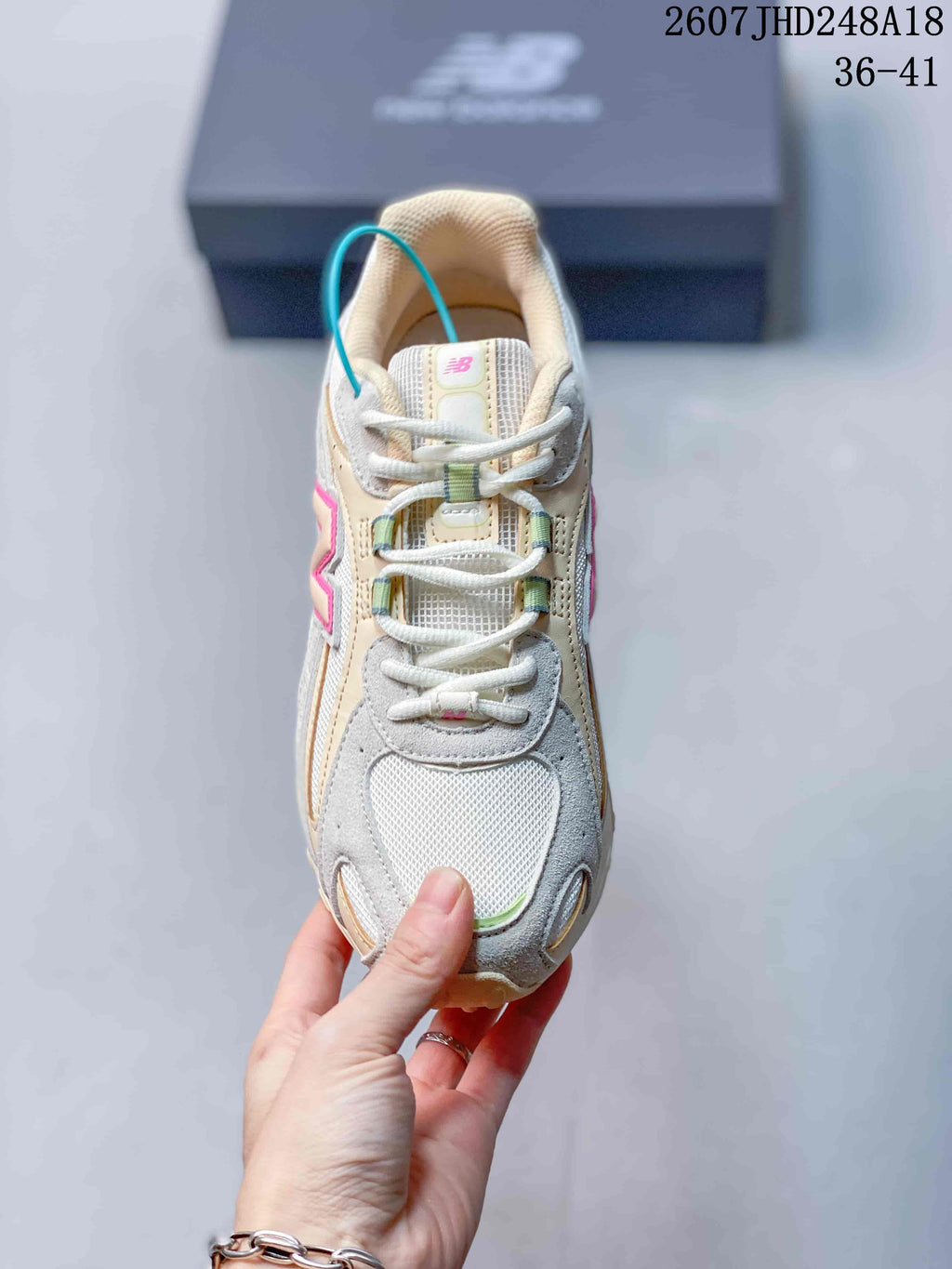 New Balance 204L Low-Top Sneakers in Cream and Gray