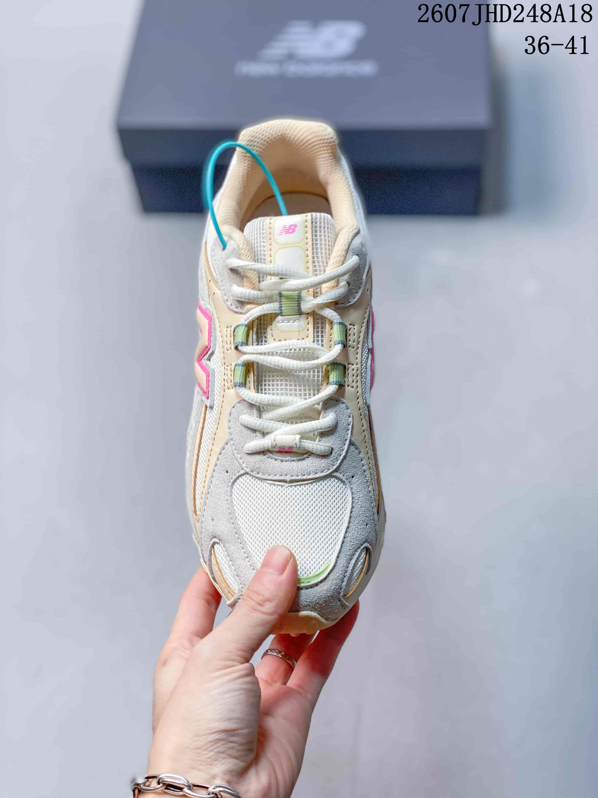 New Balance 204L Low-Top Sneakers in Cream and Gray