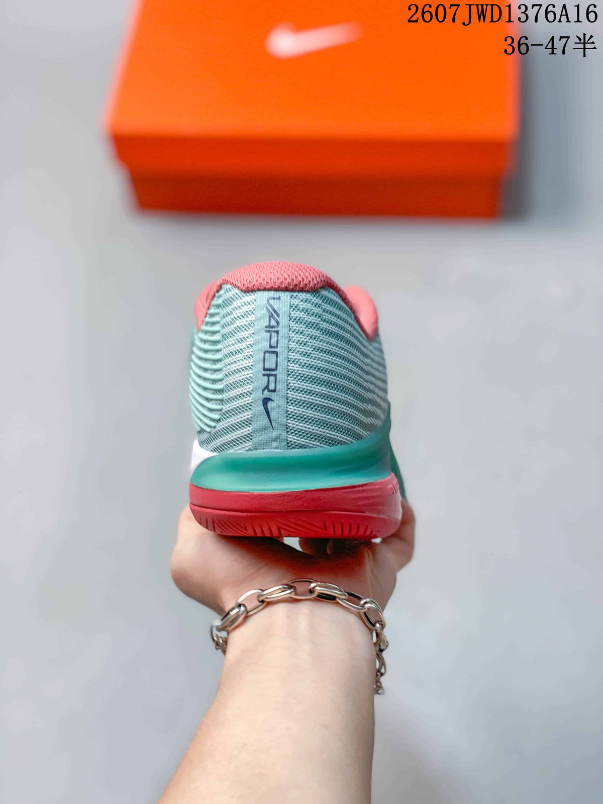 Nike Vapor 12 Low-Top Tennis Sneakers in Mint Green and Coral