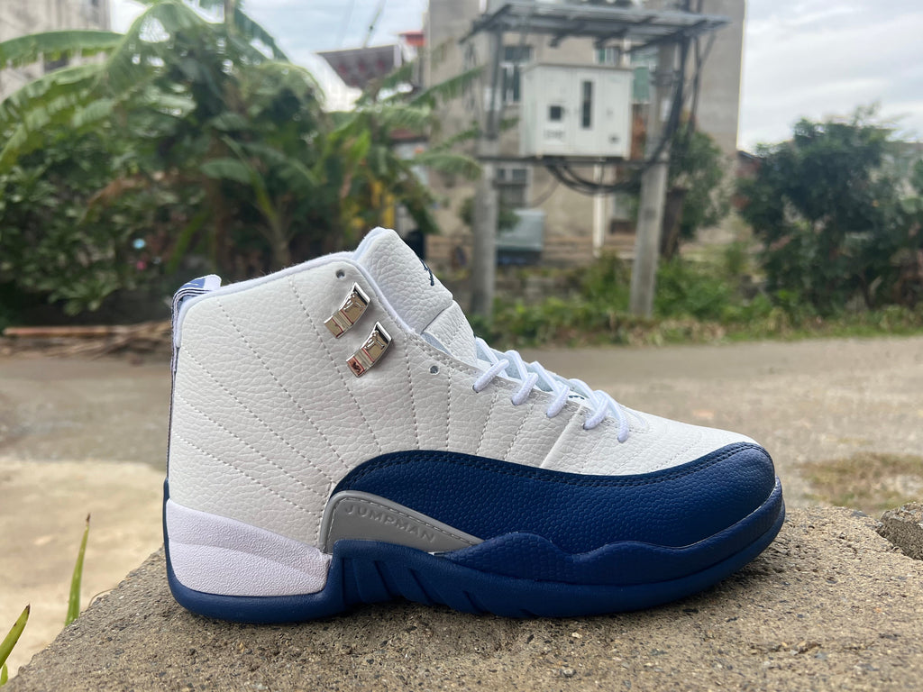 Jordan Air Jordan 12 High Sneakers White and Navy