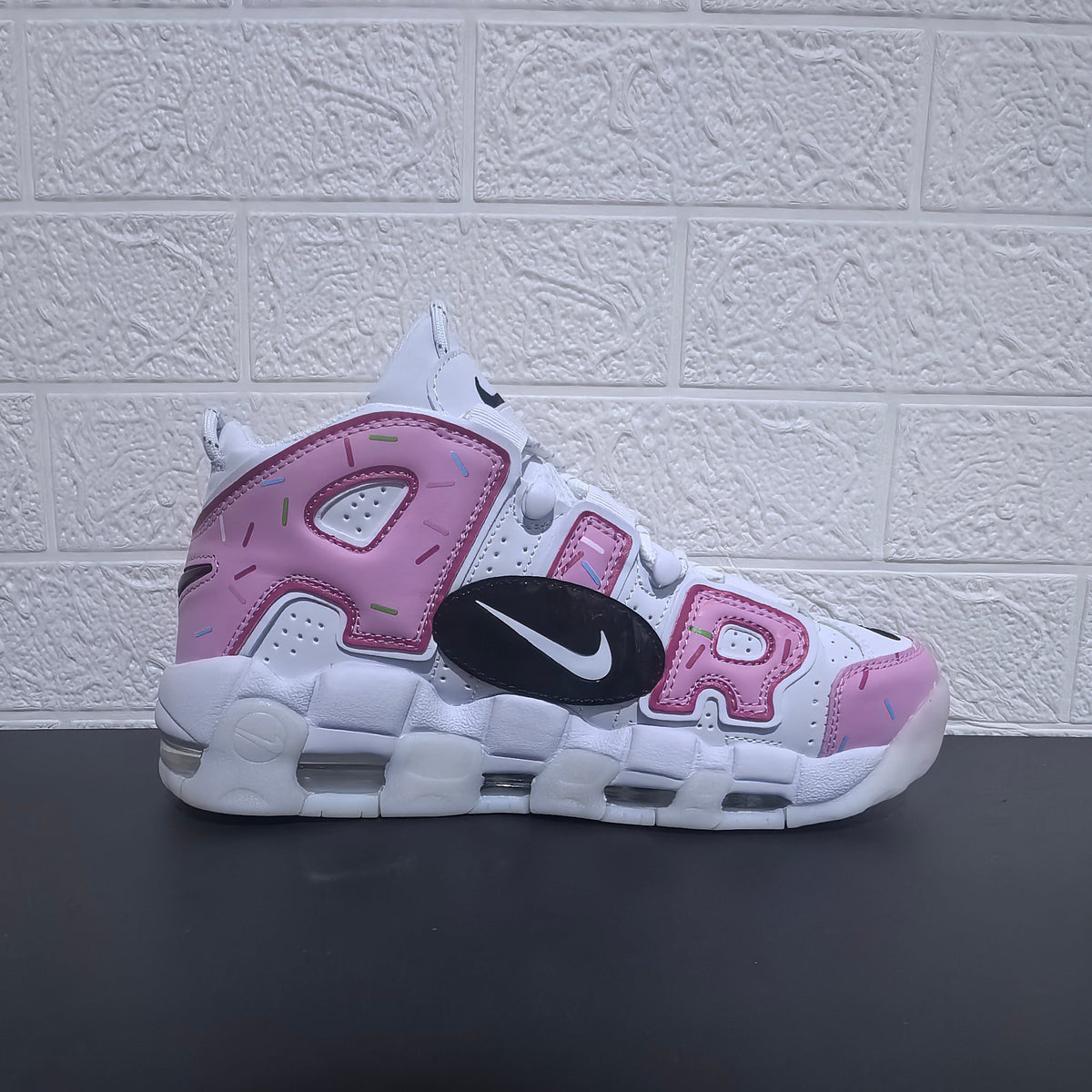 Nike Air More Uptempo Donut Sneakers in White and Pink
