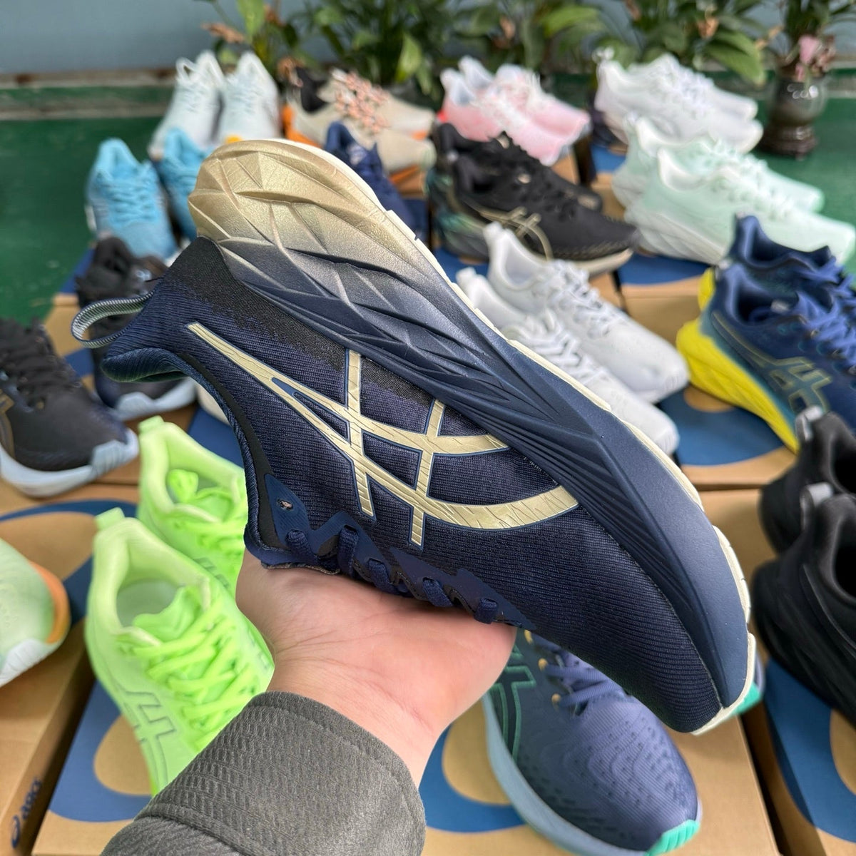 ASICS NOVABLAST 4 Running Shoes, Blue and Gold