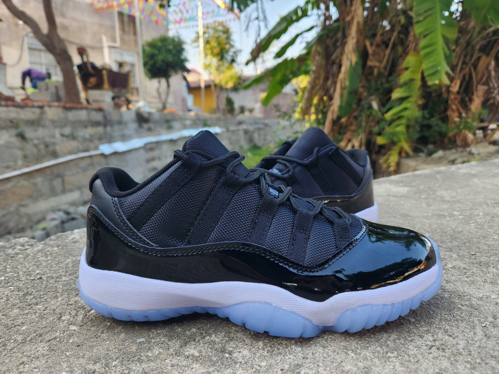 Air Jordan 11 Low Black and White Sneakers