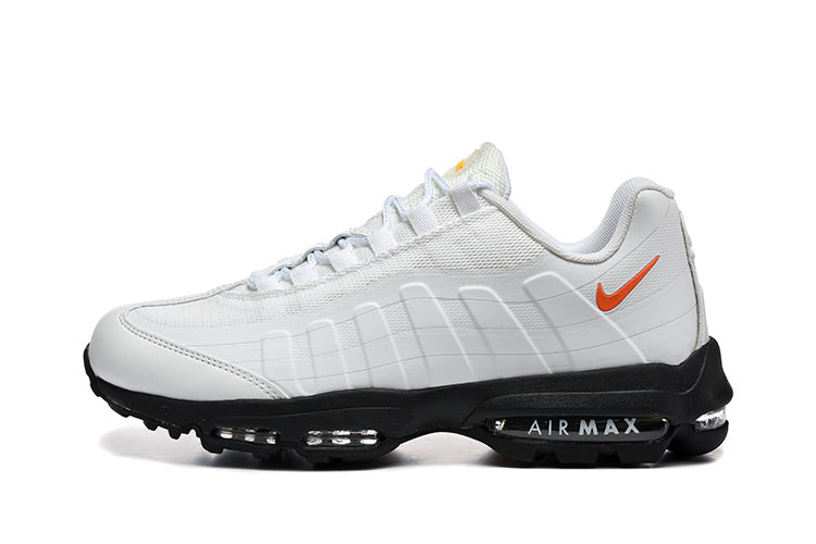 Nike Air Max White and Black Sneakers with Orange Swoosh