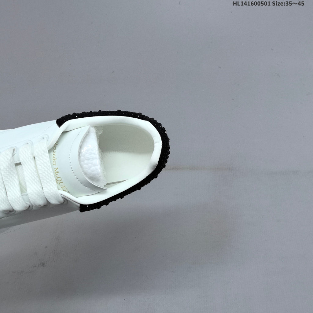 Alexander McQueen Oversized White Low-Top Sneakers with Black Heel