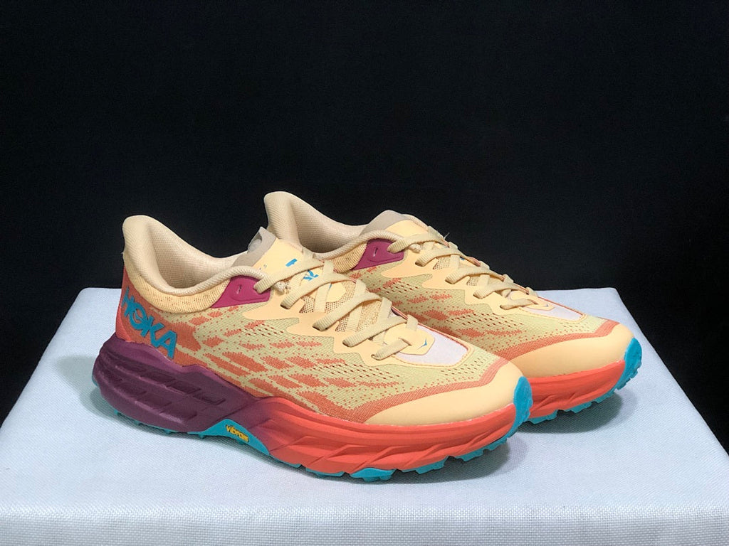 HOKA Speedgoat 5 Trail Running Shoes in Yellow and Coral