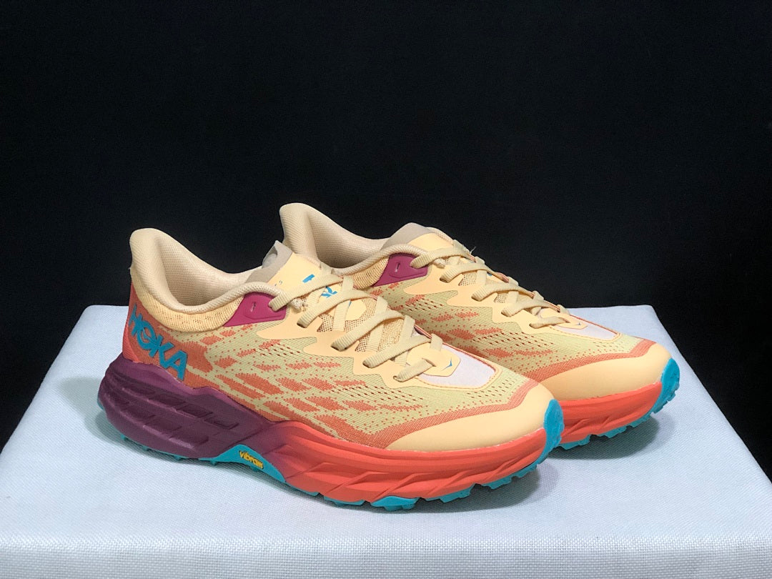 HOKA Speedgoat 5 Trail Running Shoes in Yellow and Coral