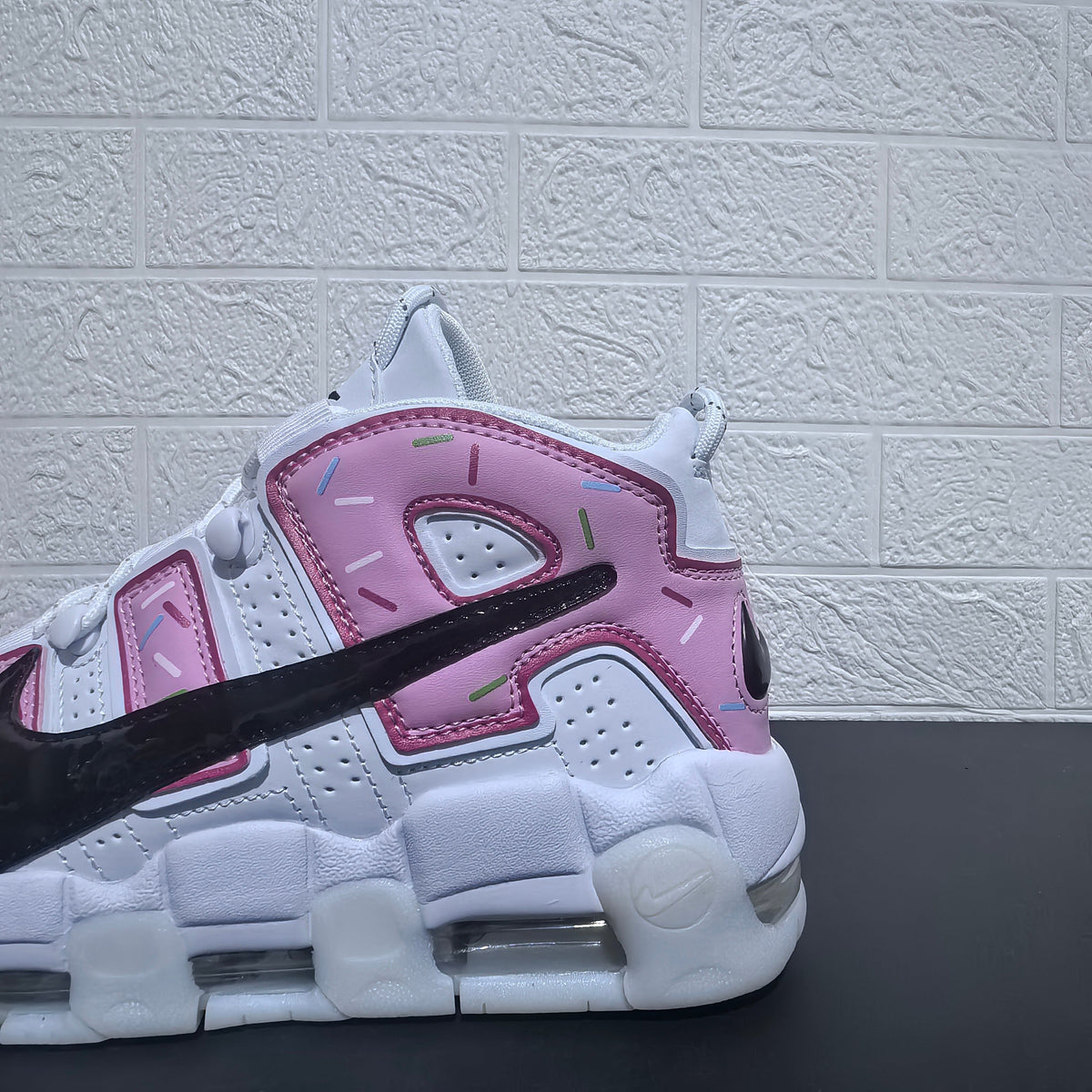 Nike Air More Uptempo Donut Sneakers in White and Pink