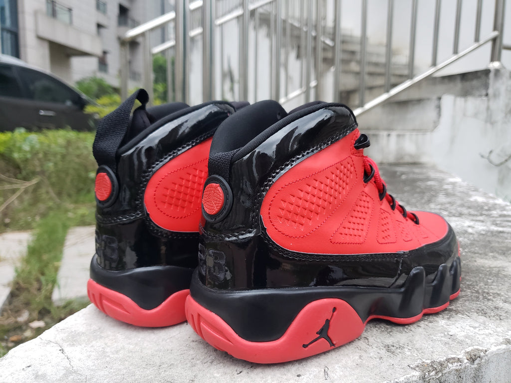 Jordan 9 High-Top Sneakers in Blue, White and Red