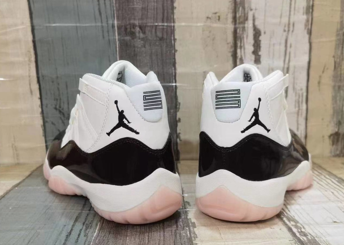 Jordan 11 High-Top Sneakers in White and Black