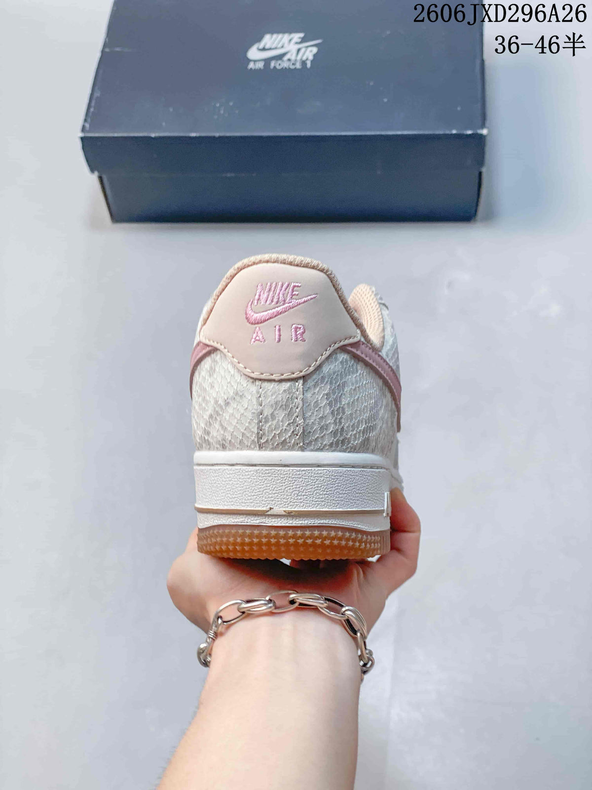 Nike Air Force 1 ’07 Low Sneakers in White and Pink