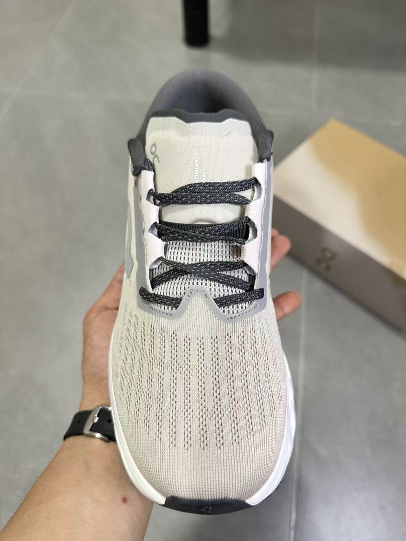 On Running Cloudmonster Sneakers in Gray and White
