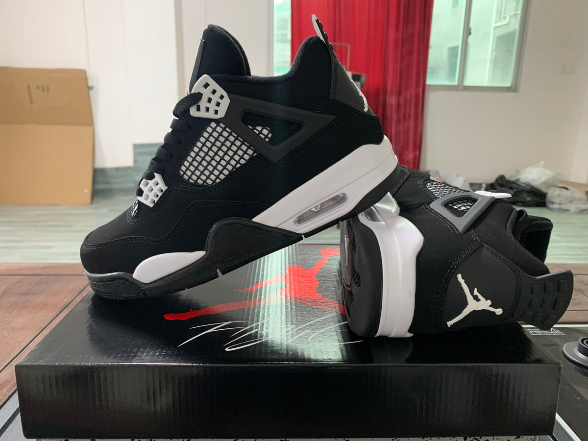Jordan 4 Retro Sneakers in White and Burgundy