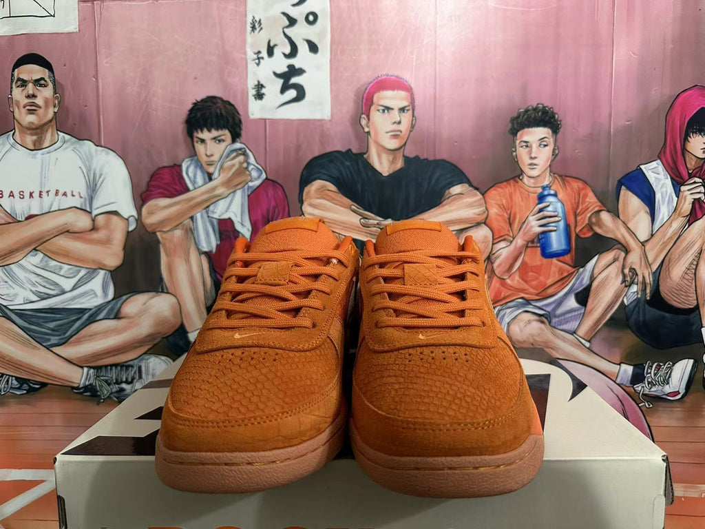Nike Orange Low-Top Sneakers with Tan Swoosh