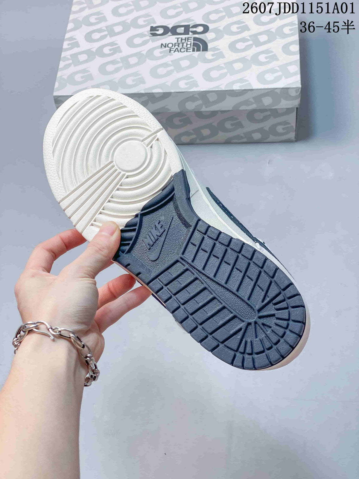 Nike SB Dunk Low x Carhartt White and Navy Sneakers
