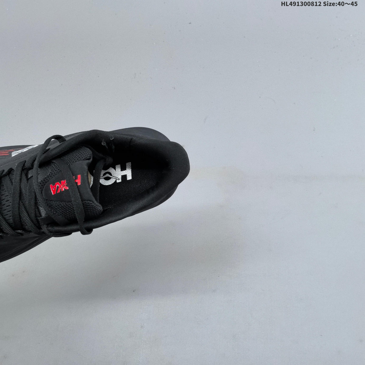 HOKA Clifton 11 Black Running Shoes with Red Accents