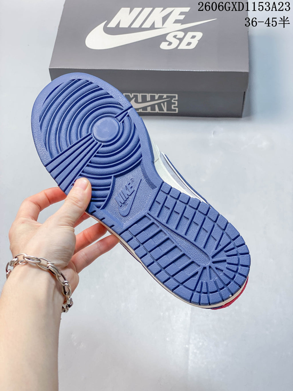 Nike SB Dunk Low Bearbrick-Inspired Cream and Blue Sneakers