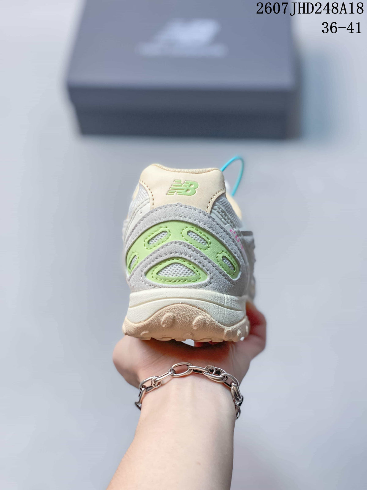 New Balance 204L Low-Top Sneakers in Cream and Gray