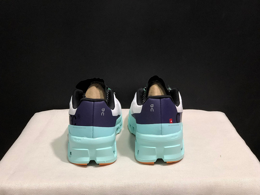 On Cloudmonster Running Shoes in White and Aqua