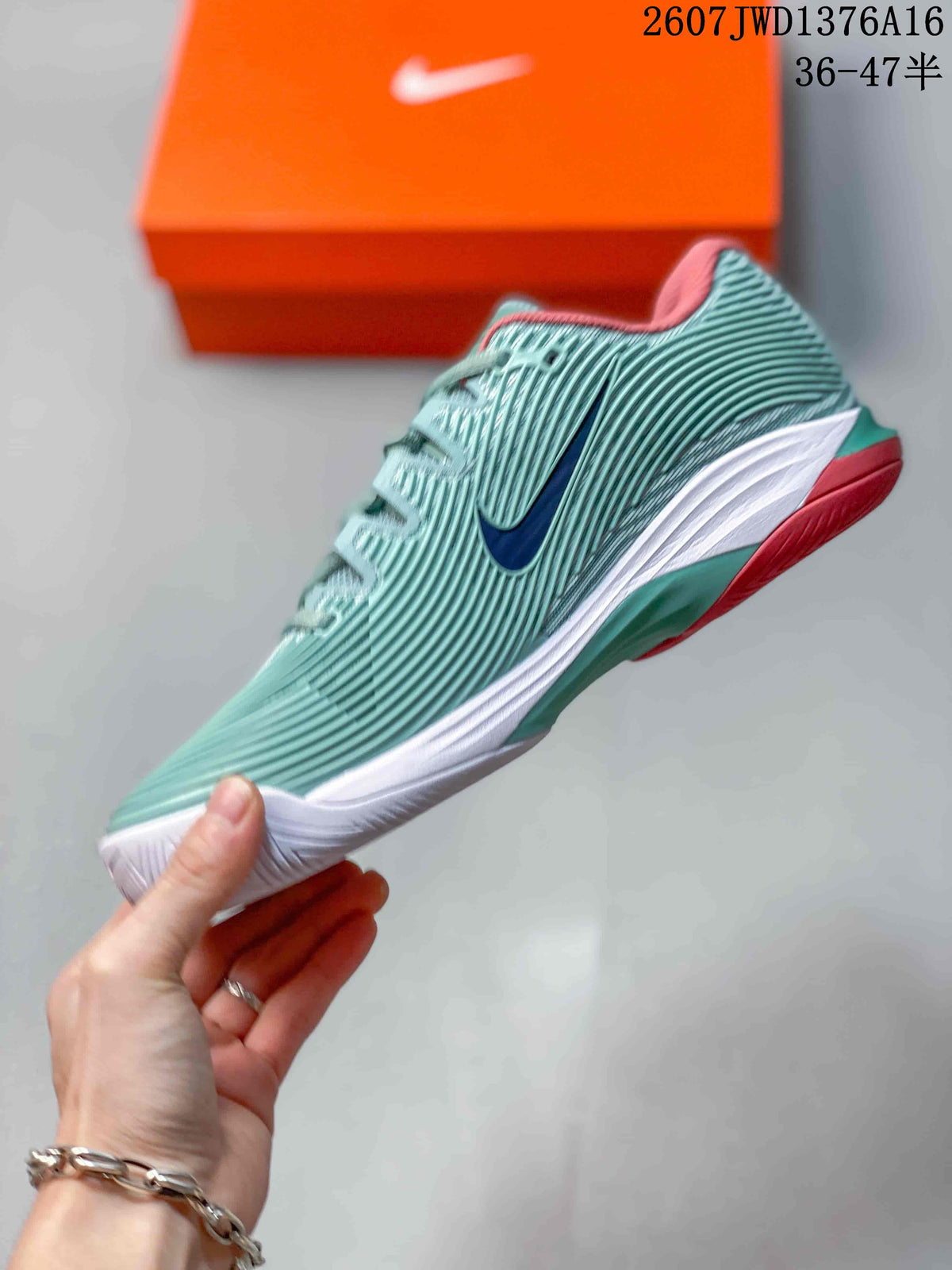 Nike Vapor 12 Low-Top Tennis Sneakers in Mint Green and Coral