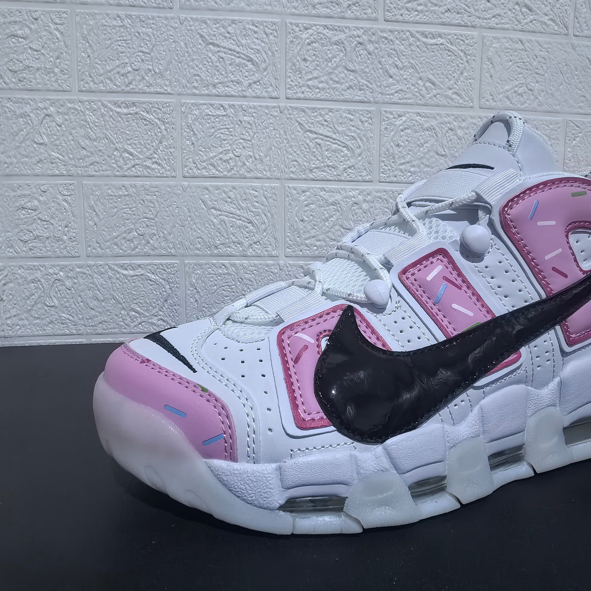 Nike Air More Uptempo Donut Sneakers in White and Pink
