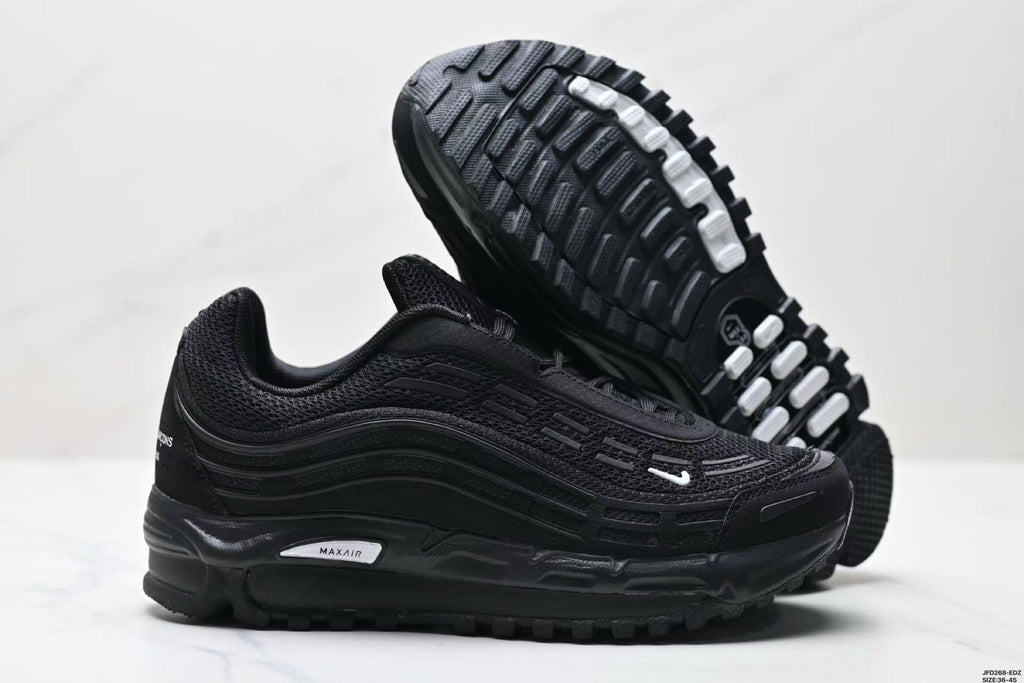 Nike Air Max Plus x Comme des Garçons Black Sneakers