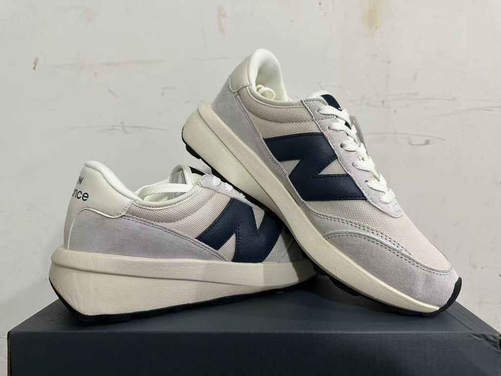 New Balance U370 Sneakers in Gray and Navy