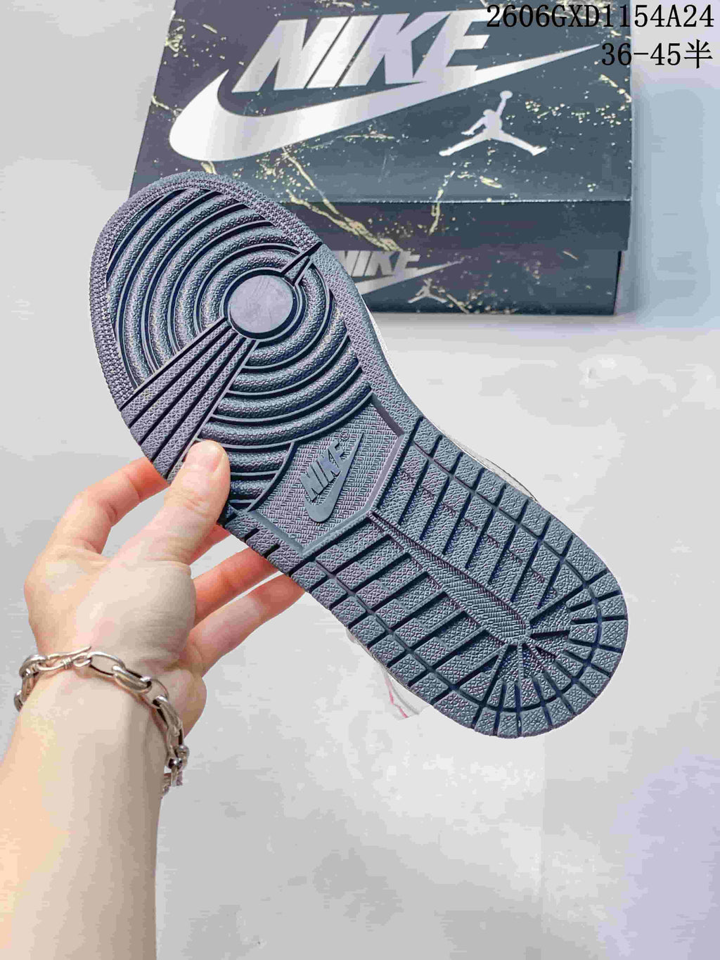 Jordan 1 Low Graffiti Sneakers in Gray and Cream