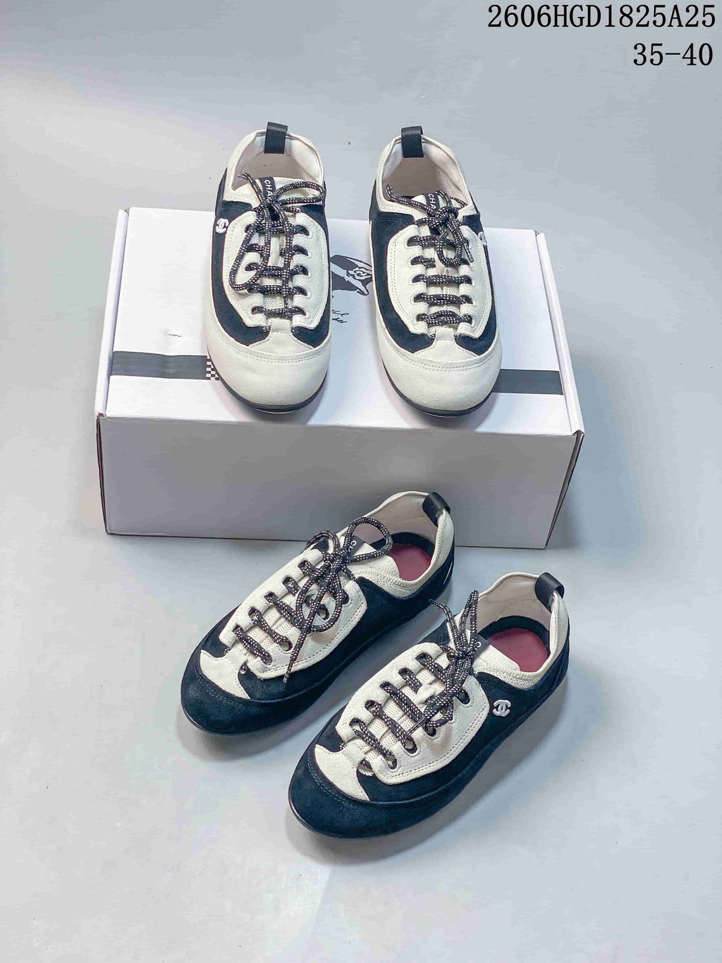 Chanel Two-Tone Low-Top Sneakers, Black and White, 2606HGD1825A25