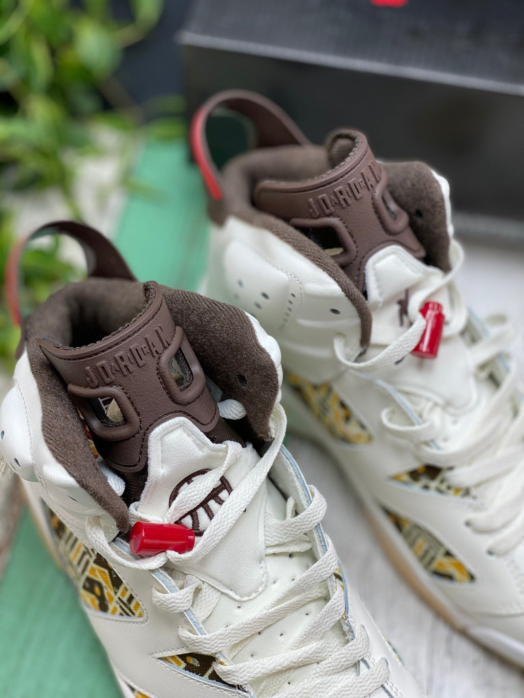Air Jordan 6 Quai 54 Sneakers in Sail and Brown