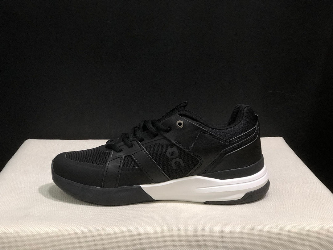 On The Roger Clubhouse Pro Black and White Sneakers