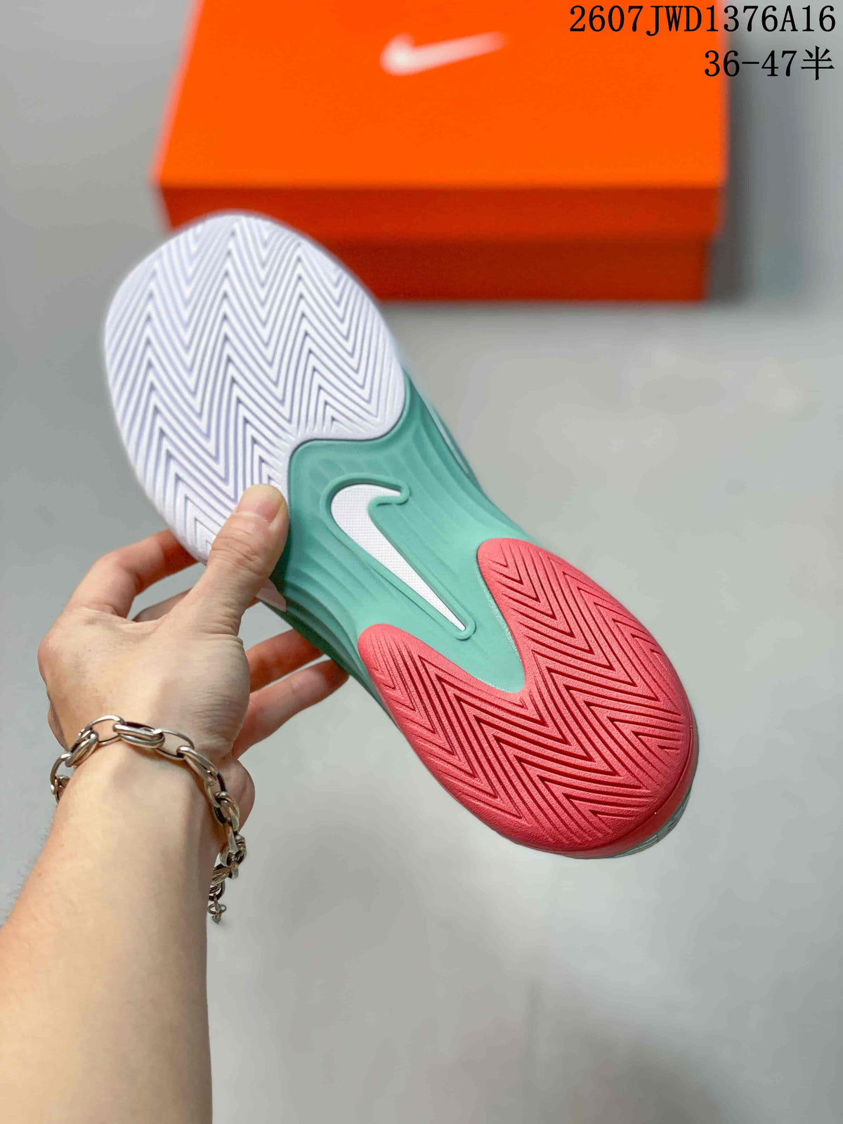 Nike Vapor 12 Low-Top Tennis Sneakers in Mint Green and Coral