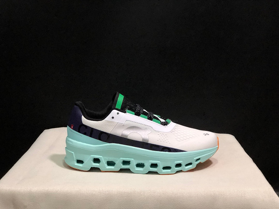 On Cloudmonster Running Shoes in White and Aqua