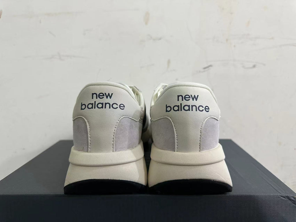New Balance U370 Sneakers in Gray and Navy
