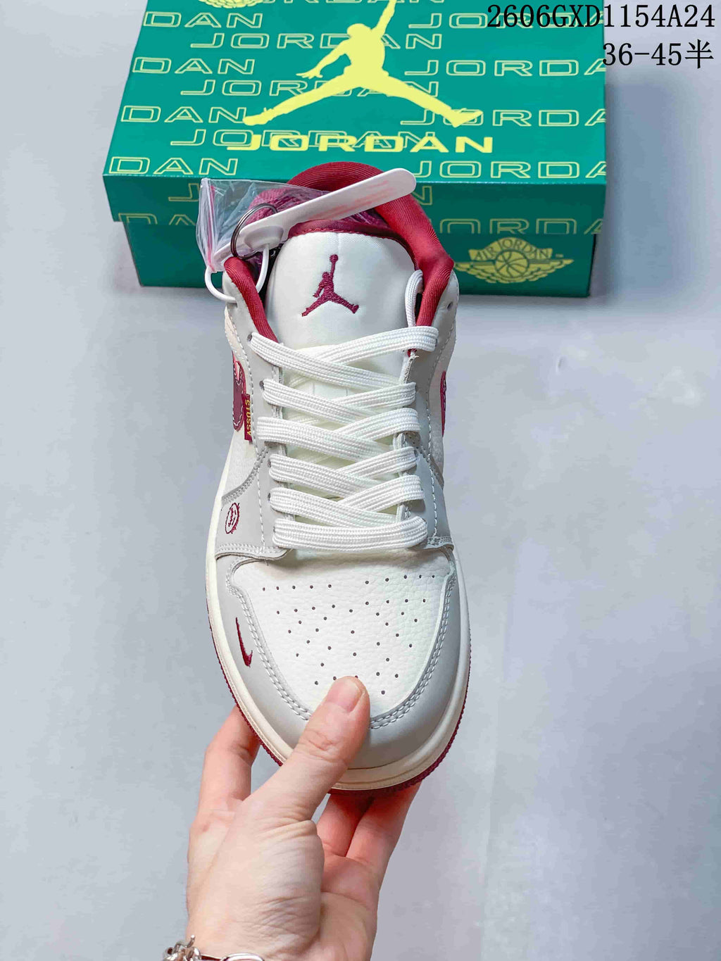 Air Jordan 1 Low Burgundy Graffiti Sneakers