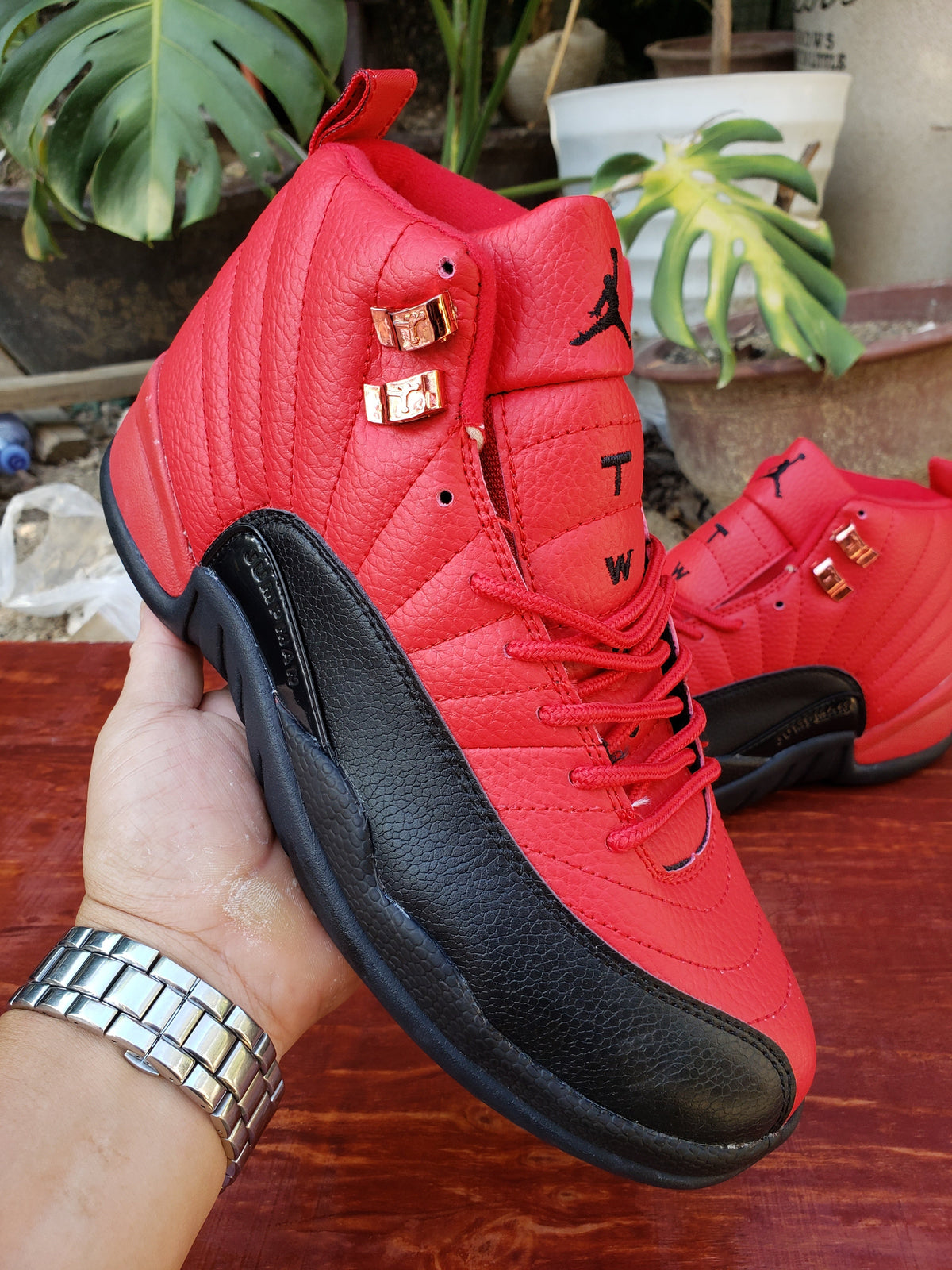 Air Jordan 12 High-Top Sneakers in Red/Black or Black/Purple