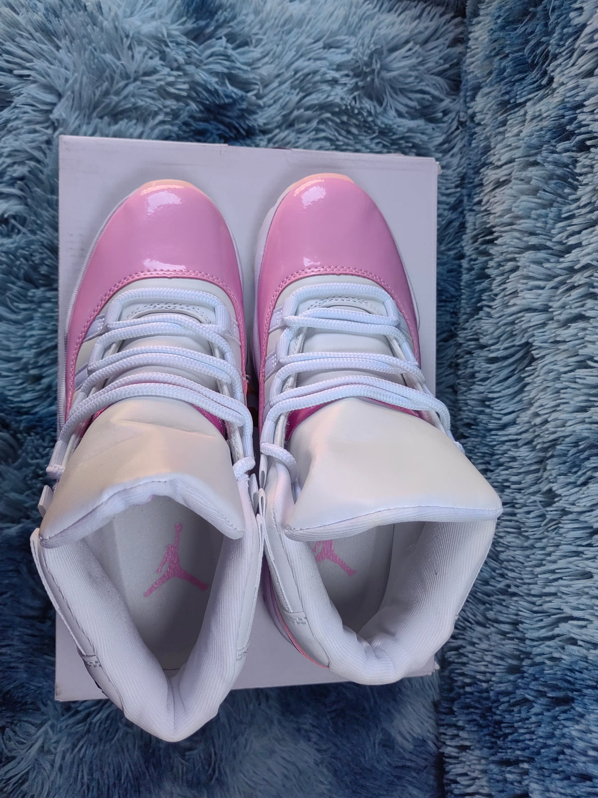 Jordan 11 Retro Pink and White High-Top Sneakers