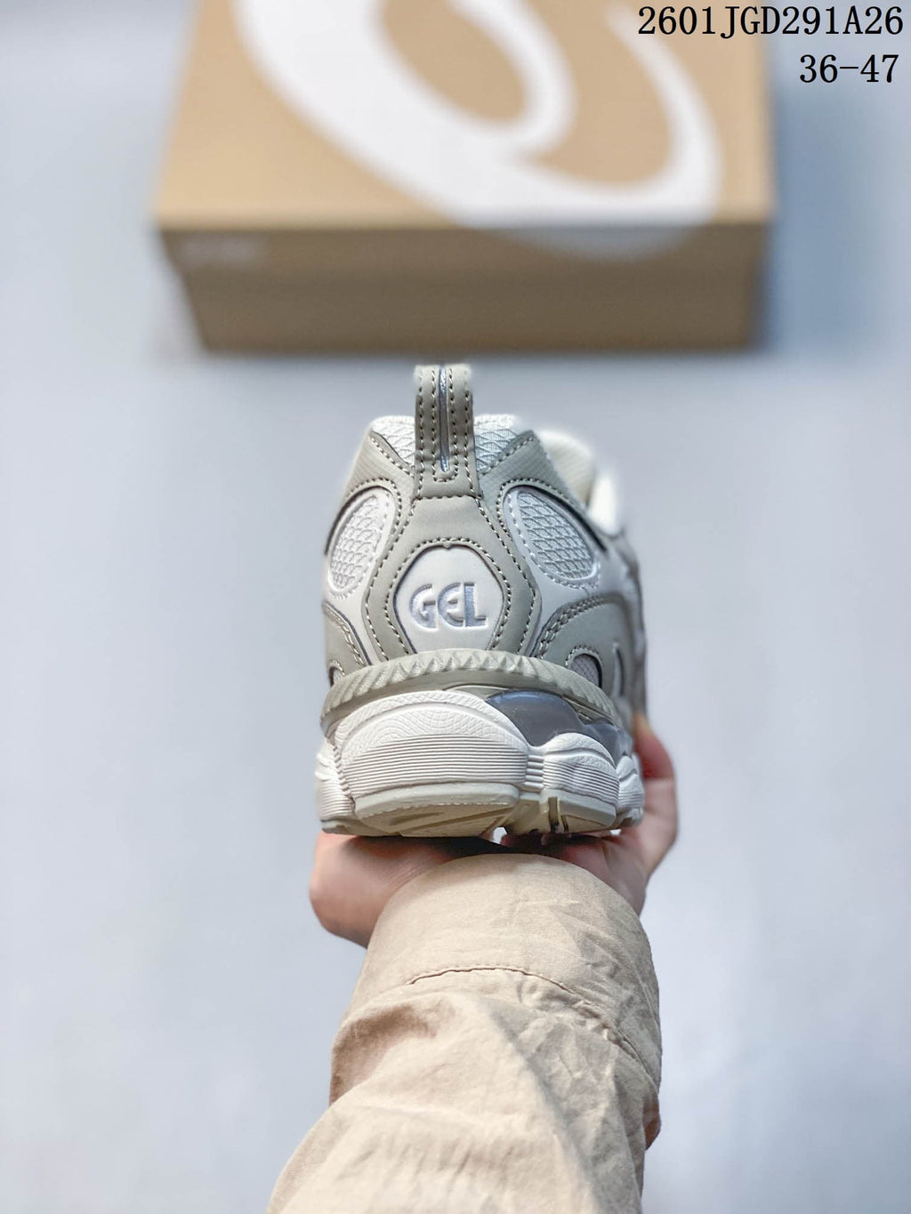 ASICS GEL-NYC Sneakers in White and Grey 1203A735-021