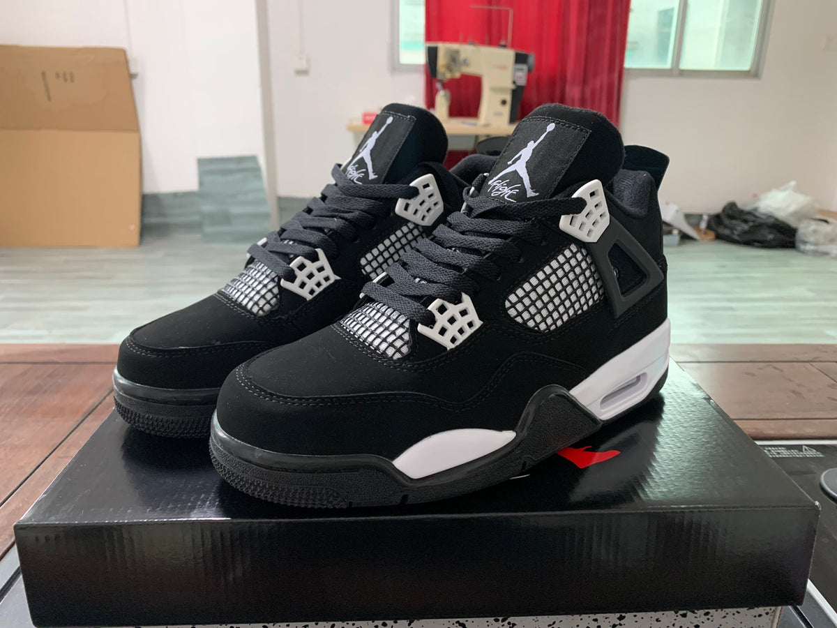 Jordan 4 Retro Sneakers in White and Burgundy
