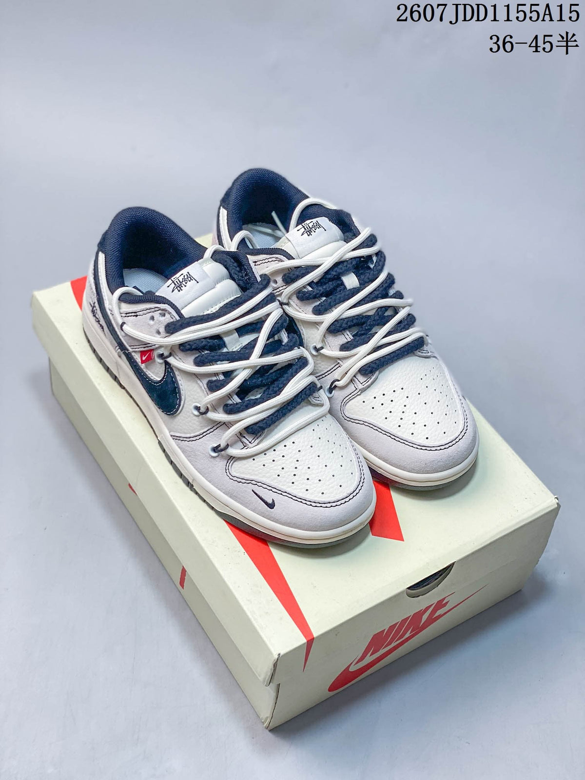Nike SB Dunk Low Sneakers in White, Gray and Navy Styles