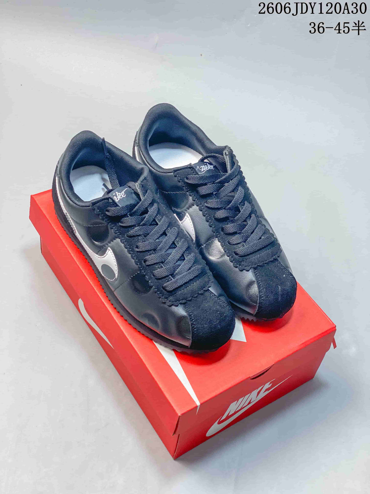 Nike Classic Cortez Low-Top Sneakers in Black or Pink