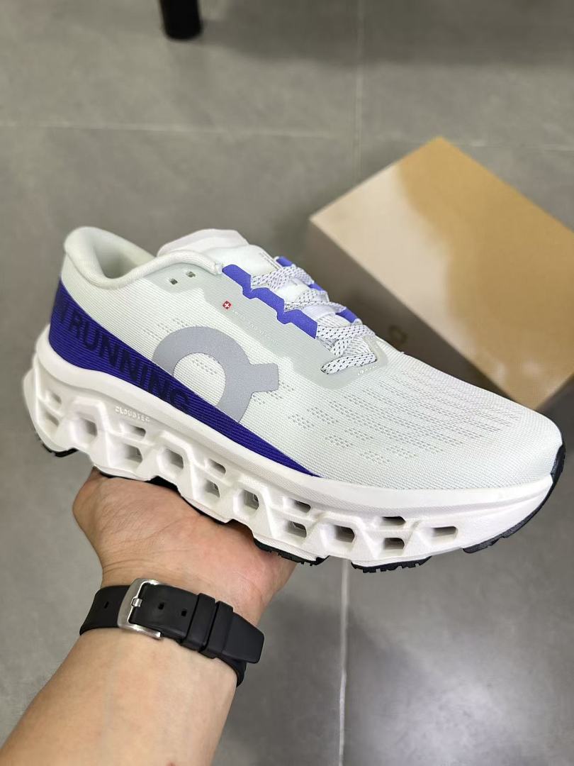 On Running Sneakers in White and Purple
