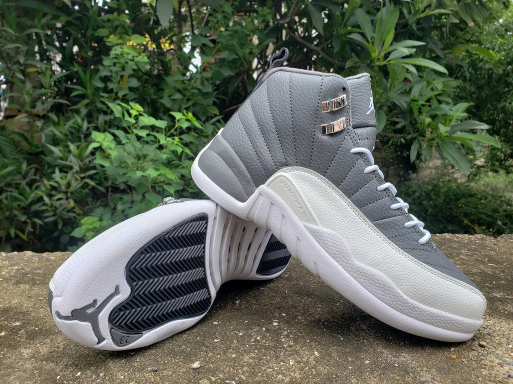 Jordan Air Jordan 12 High-Top Sneakers in Grey and White