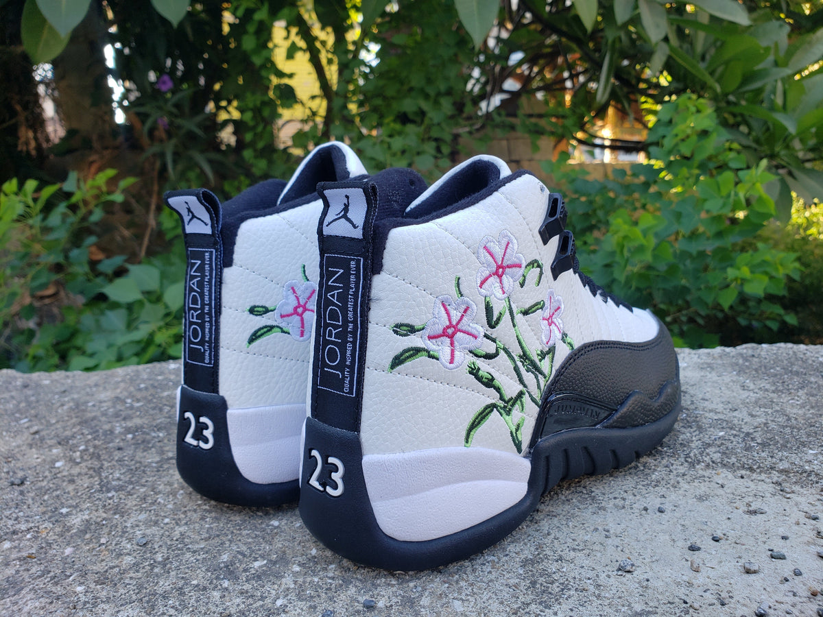Jordan 12 White and Black Floral High-Top Sneakers