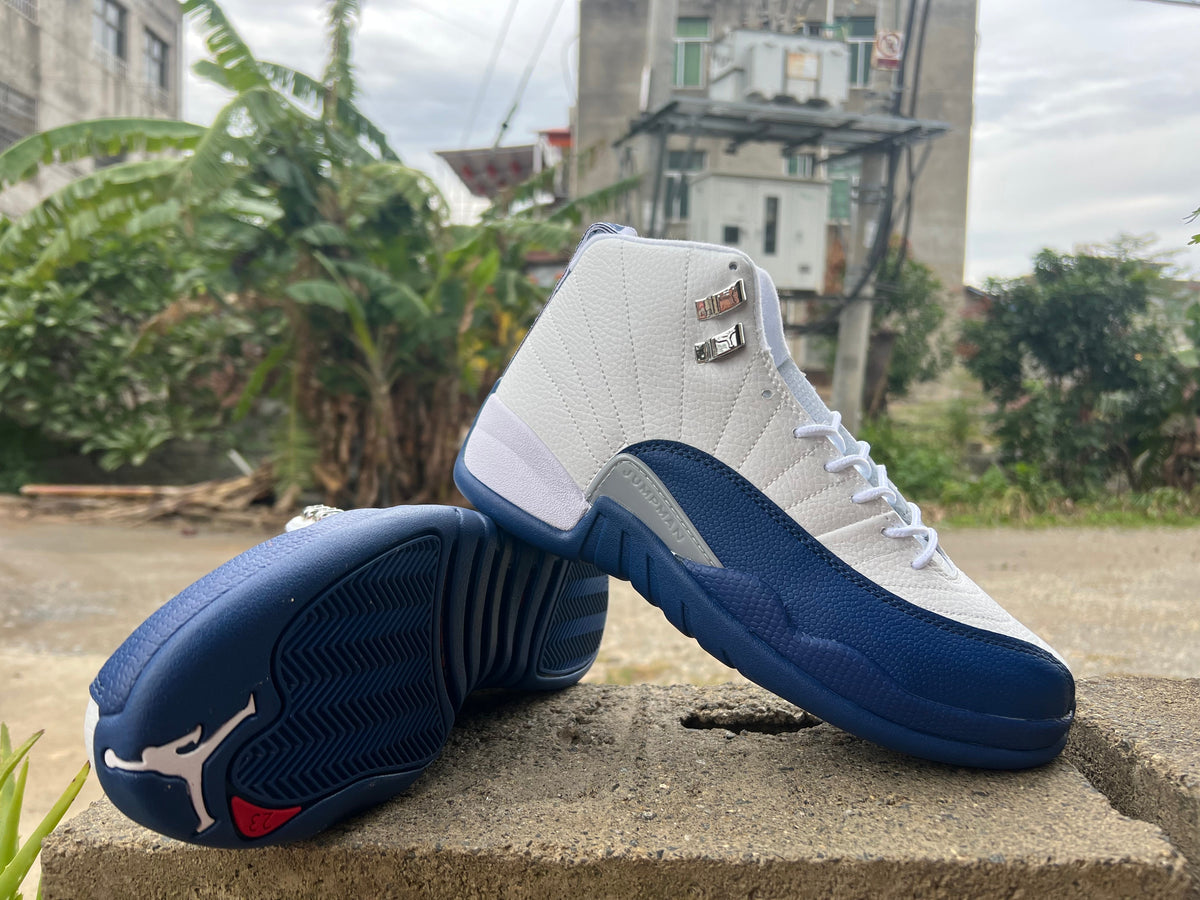 Jordan Air Jordan 12 High Sneakers White and Navy